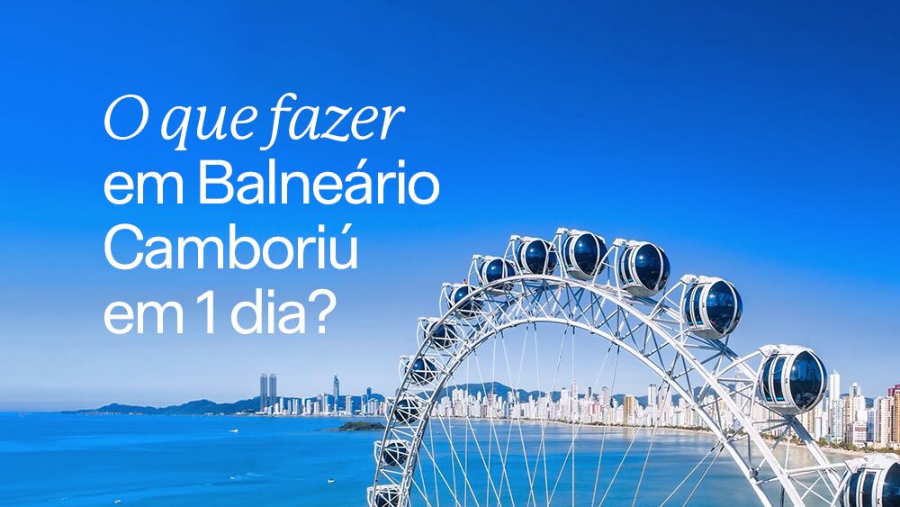 Roda-gigante em Balneário Camboriú sob céu azul.